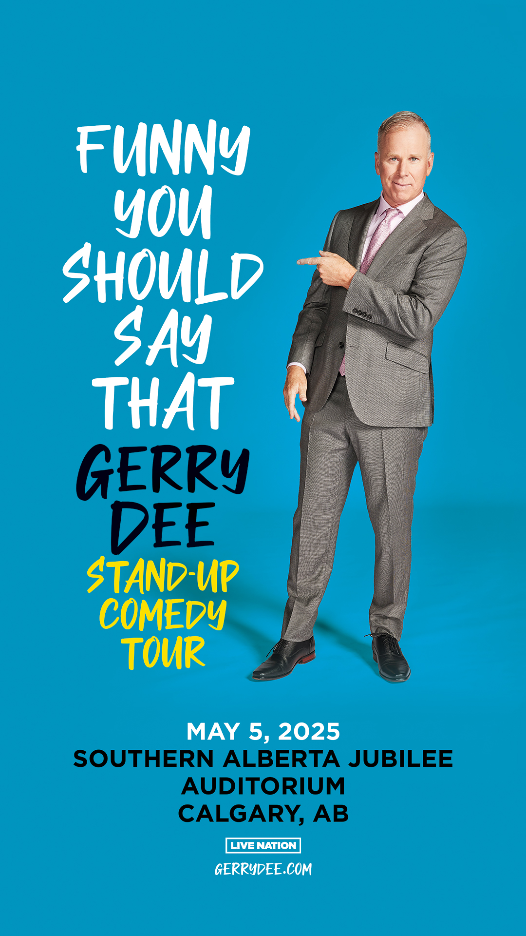 Comedian Gerry D standing in a grey suit point at text White, Black and Yellow) that reads Funny You Should Say That.